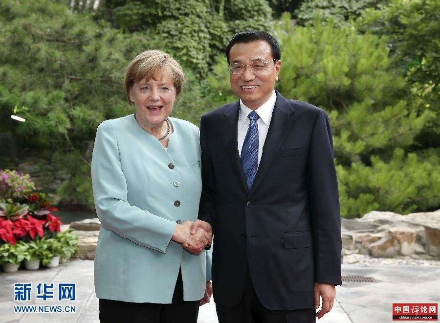 7月6日，国务院总理李克强在北京钓鱼台养源斋会见来华进行正式访问的德国总理默克尔。 新华社记者 庞兴雷 摄 
