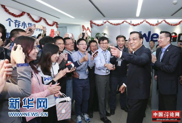 1月4日至6日，中共中央政治局常委、国务院总理李克强在广东深圳、广州考察。这是1月4日，李克强在深圳前海微众银行考察。新华社记者丁林 摄